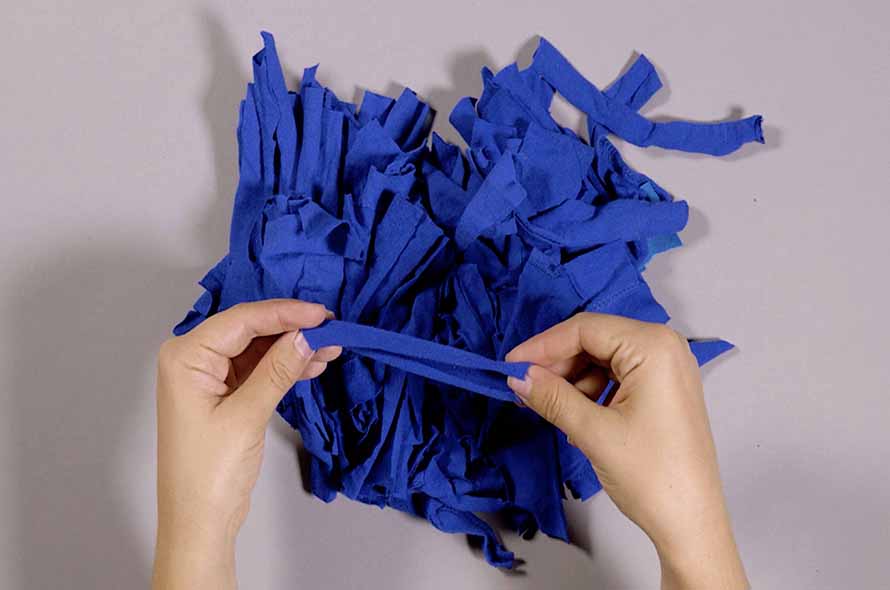 Pieces of a jumper being tied together